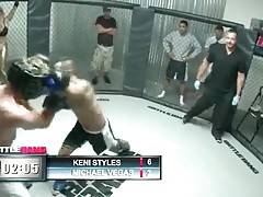 Tough Asian fellow Keni Styles is winning for now.